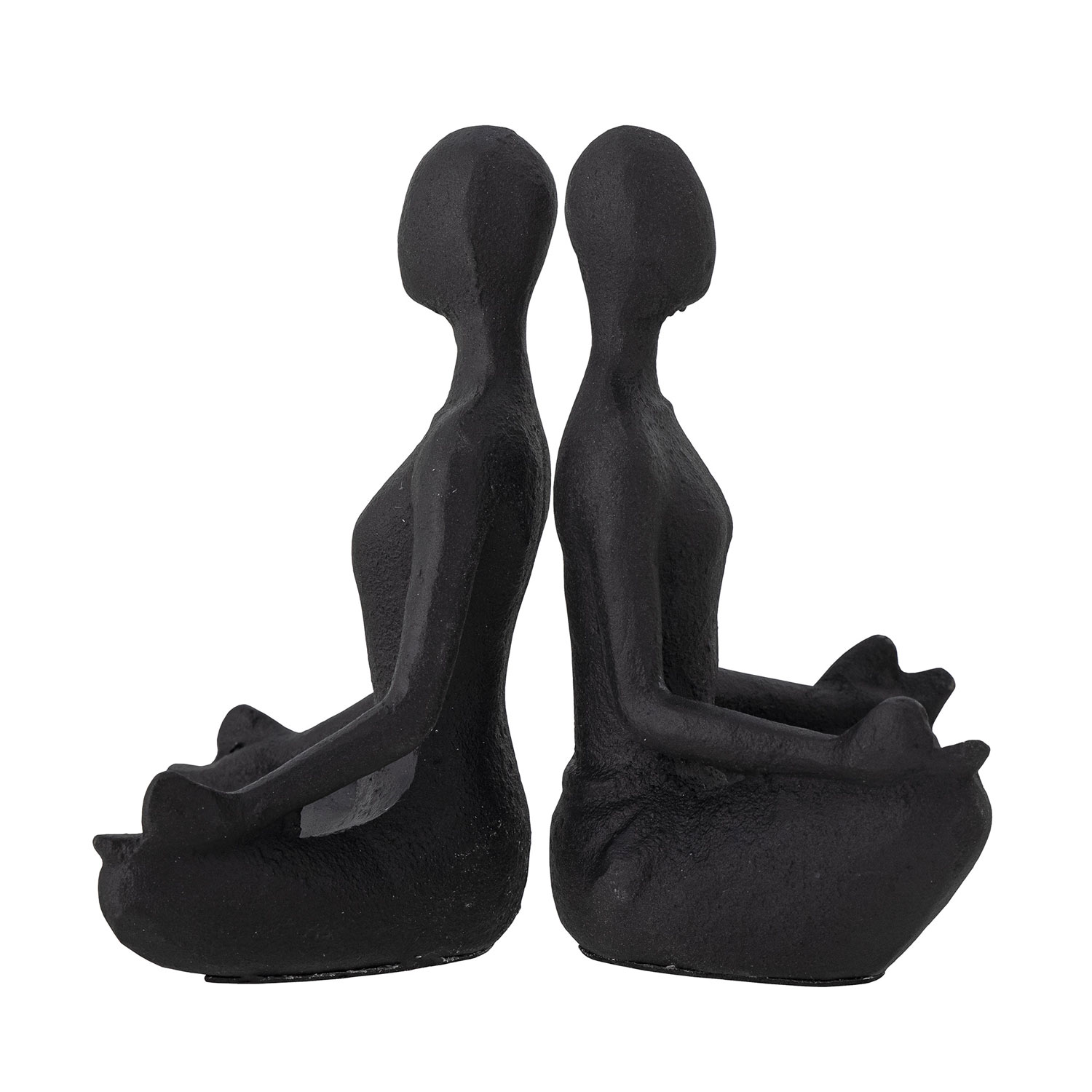 Schwarze_Buchstuetzen_82057528 Schwarze schwere Figuren als Buchstützen